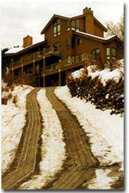 Steep driveway retrofitted with radiant snow melting system.