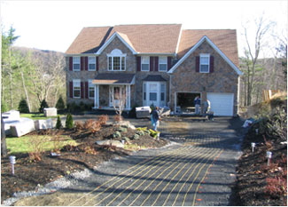 An electric heated driveway being installed