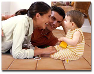 Family on warm tile floor.